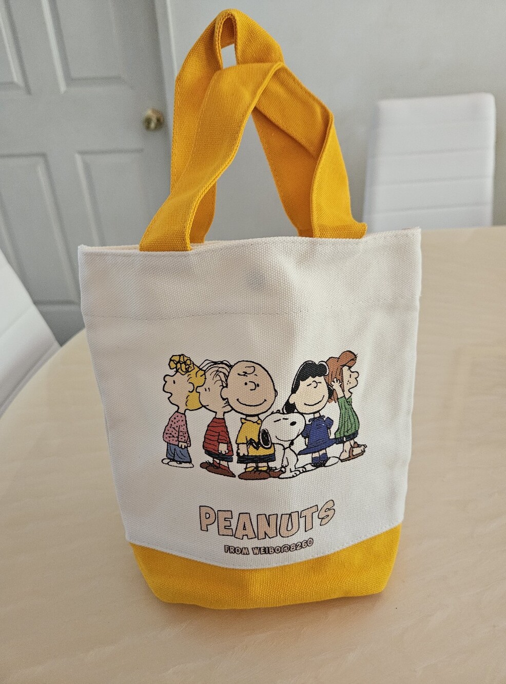 Peanuts White Canvas Tote with Yellow Handles and Base